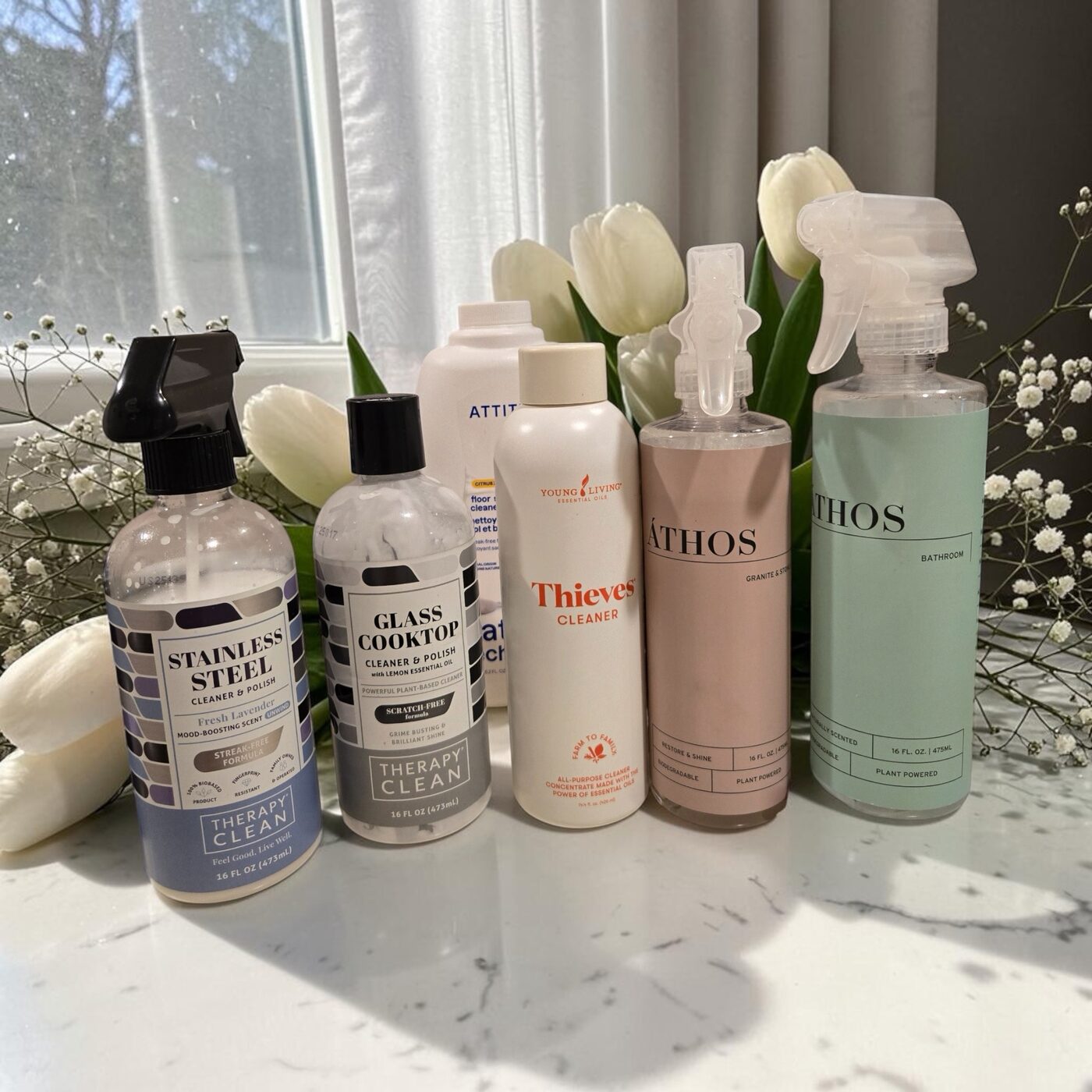 Non-toxic, plant-based cleaning products used by A to D Cleaning — Thieves, Therapy Clean, Attitude and Athos